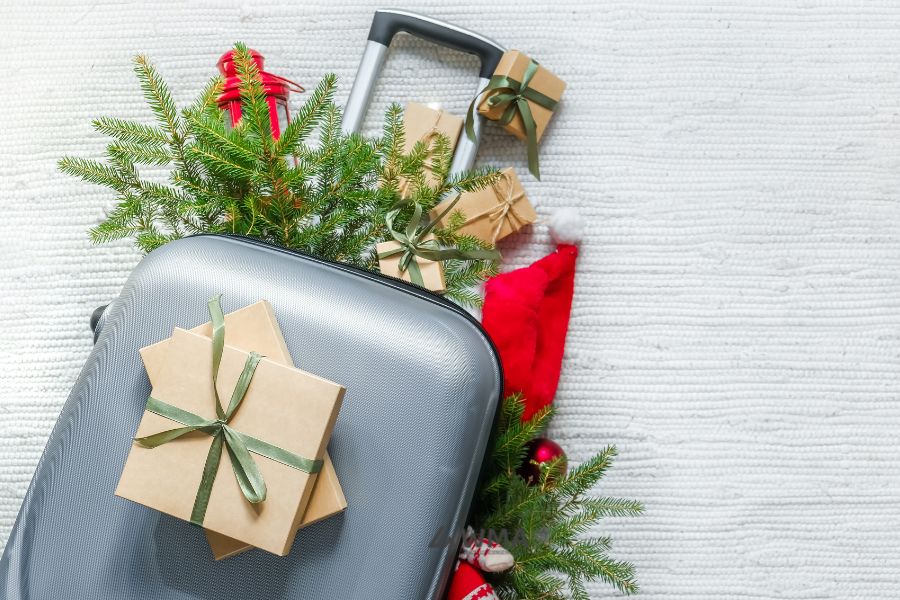 A suitcases and Christmas gifts